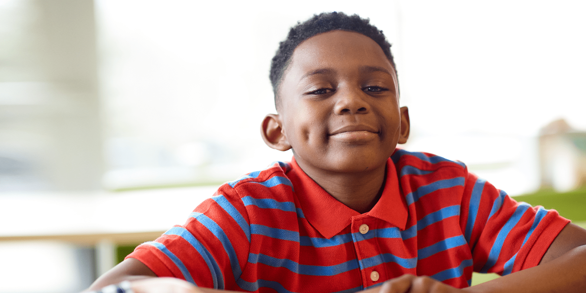 An image of a child smiling.